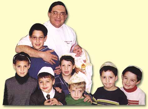 Picture of Rabbi Krohn with some of the many satisfied customers